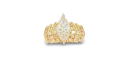 14K Gold CZ Marquise Ring: This beautiful ring is size 7 and has a 2 carat estimated CZ marquise style stone. The main stone is complemented by 28 smaller CZ stones. The design spans approximately .5 inch by .75 inch. Ring