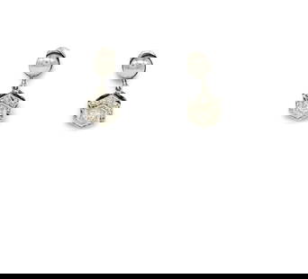 14K White Gold and Diamond Earrings: Hexagonal 14K white gold settings hang from 14K white gold twist back posts and each hold .5 carats of diamond. Earrings measure .75 inch from post. Earrings weigh 2.6g.