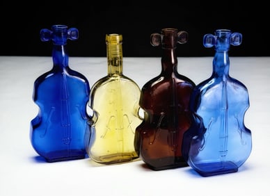 Collection of Four Violin-Shaped Glass Bottles
