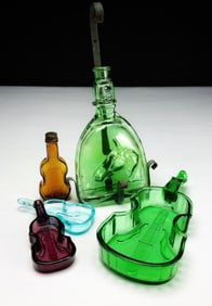 Assorted Colored Glass Bottles and Dishes