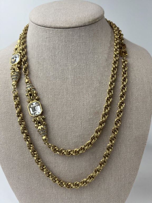Givenchy French Costume Jewelry Necklace: Givenchy French Costume Jewelry Necklace. Gilt metal and rhinestone necklace with entwined multi link construction rope chain. Signed on clasp. Measures approximately 41 inches in length.