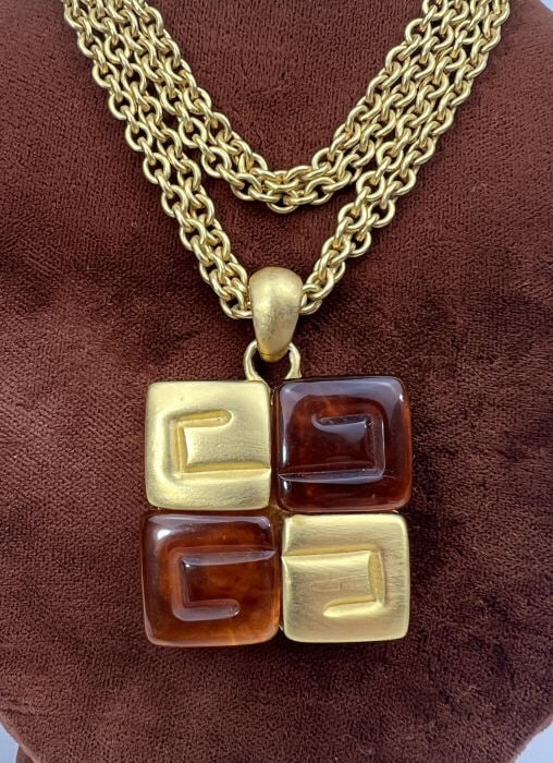 Givenchy French Costume Jewelry Necklace: Givenchy French Costume Jewelry Necklace. Signed tag at clasp, double rolo link necklace chain in gilt metal with Givenchy design logo pendant in faux tortoise and gilt metal. Chain measures 18 inches