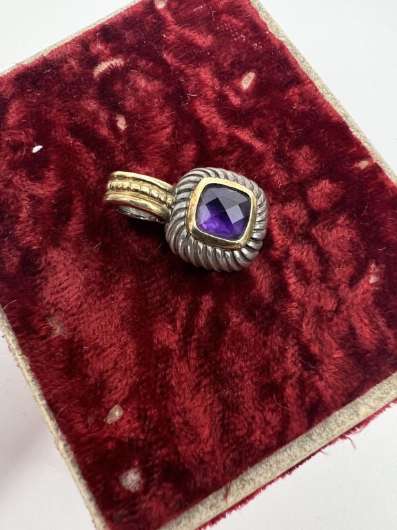 David Yurman Sterling & 14kt Amethyst Pendant: David Yurman Sterling & 14kt Amethyst Pendant. Set with a briolette amethyst at center with 14kt gold halo. Signed D. Yurman and hallmarked 925 / 585 on the back. Bail is hinged, opens / closes. Measu