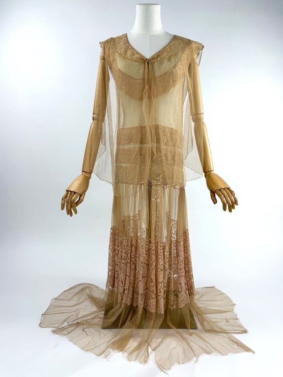 Antique 1920s Net Crochet Lace Dress Sheer Gown: Antique 1920s Beige Net Cotton Crochet Lace Dress Sheer Gown. Lace details throughout with ruched skirt and slight car wash hem. Sheer throughout. Good antique condition with light wear throughout con