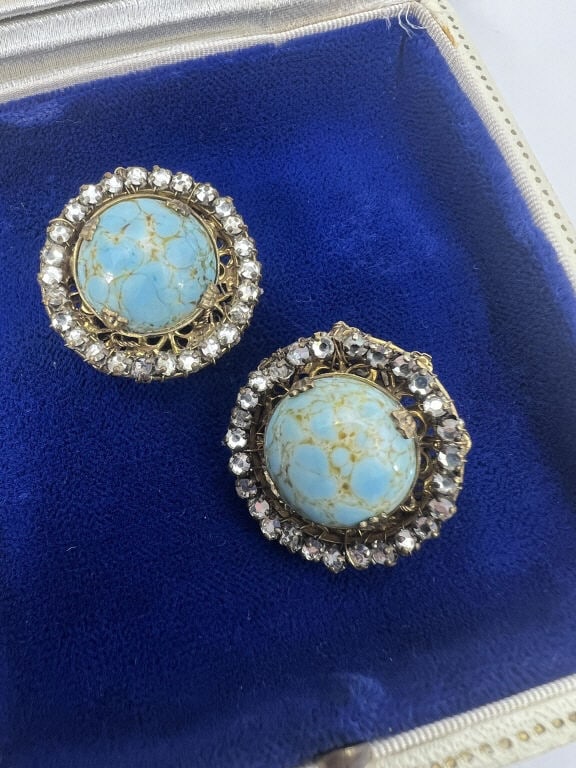 Miriam Haskell Vintage Costume Jewelry Earrings: Miriam Haskell Vintage Costume Jewelry Earrings. Pair of signed clip on earrings by American designer Miriam Haskell in gilt metal with rhinestones and turquoise glass cabochons. Each just under 1 inc