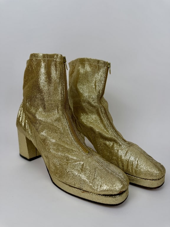 Vintage 1960s Gold Lamé Mod Disco Ankle Boots: Vintage 1960s Gold Lamé Mod Zip Up Ankle Boots Platforms Disco Shoes. Opens at front with zipper. Marked size 11. 3" heel. All man made materials. Light wear throughout consistent with age.