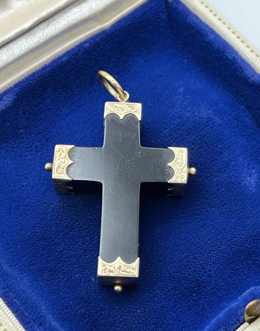 Antique 19th C 10kt & Whitby Jet Cross Pendant: Antique 19th C 10kt & Whitby Jet Cross Pendant. Cross form necklace pendant carved from Whitby jet and capped with chased 10kt yellow gold fittings. Measures nearly 2.25 inches in length. Acid tests f