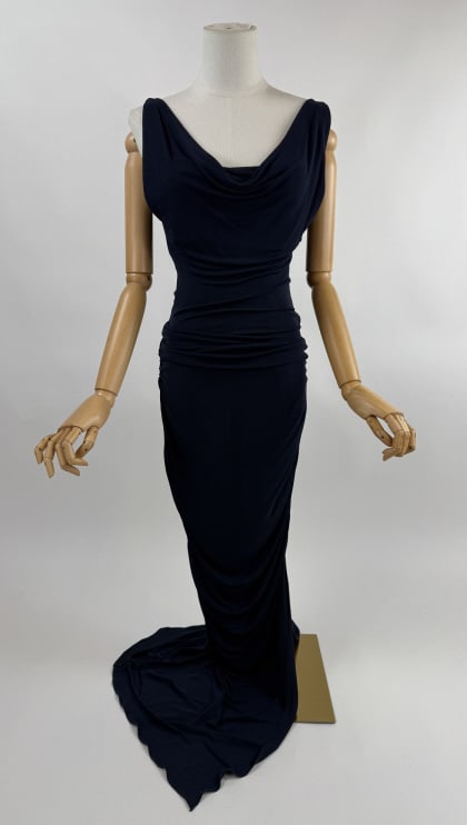 Vintage Moschino Cheap & Chic Jersey Knit Dress: Vintage Moschino Cheap & Chic Navy Blue Jersey Knit Ruched Dress. With cowl neck and ruching down sides. Side zip to close. Marked size US 8 with stretch throughout. Measures 32 - 36 inch bust, 24 - 3