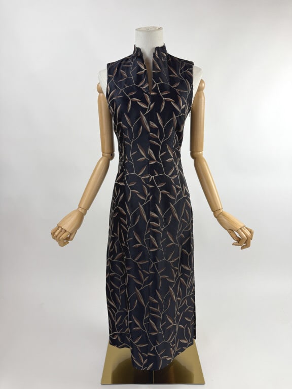 Vintage 1997 Prada Silk Leaf Botanical Print Dress: Vintage 1997 Prada Silk Leaf Botanical Print Dress. In the manner of traditional Chinese Qipao dress with Mandarin collar and fitted throughout body. Slits up side seams. Zips at side to close. 100% s