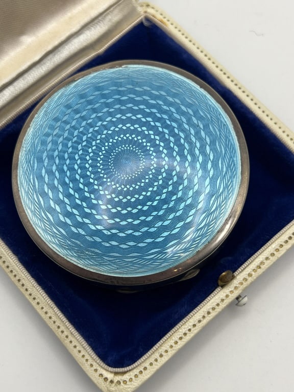 Antique English Sterling & Guilloche Enamel Box: Antique English Sterling & Guilloche Enamel Box. English hallmarks on the back. Top with blue guilloche enamel. Interior of the lid with mirror. Measures nearly 2.75 inches in diameter.