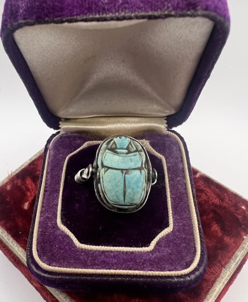 Estate Egyptian Antique Scarab Bead Mount Ring: Estate Egyptian Antique Scarab Bead Mount Ring. Sterling silver setting with revolving mounted scarab bead. Faience scarab with hieroglyphics on the back in turquoise blue tone. Ring size 4.5