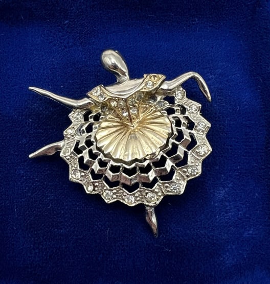 Vintage Costume Jewelry Boucher Dancer Brooch: Vintage Costume Jewelry Boucher Dancer Brooch. Two tone silver and gold color metal with rhinestones. Apparently unsigned, but identified as Boucher. Measures approximately 1.75 inches in length.