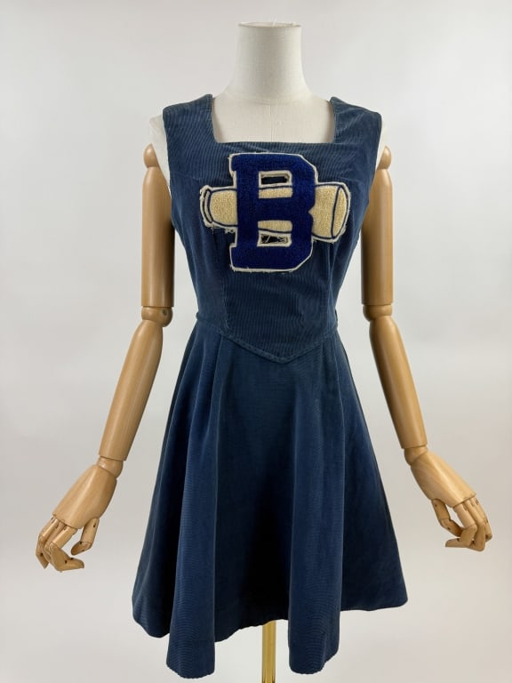 Vintage 1950s Blue Corduroy Cheerleader Dress: Vintage 1950s Blue Cotton Corduroy Cheerleader Uniform Dress. Large B patch at chest. Zips up side to close. Circle skirt. 36 inch bust, 26 inch waist, 34 inches long.