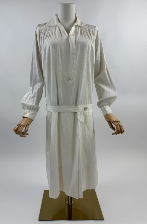 Antique 1920s White Cotton Deco Smock Dress: Antique 1920s White Patterned Cotton Dress Drop Waist Deco Peasant Style Smock Shift. Art Deco details throughout. Belted at waist, ties in back with single pocket. No closures, slides over head. MOP 