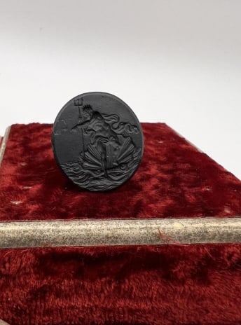 Antique 19th C Bloodstone & Poseidon Fob Pendant: Antique 19th C Bloodstone & Poseidon Fob Pendant. Intaglio of Poseidon, hand carved, set with sterling silver bail. Measures 1.25 inches in length.