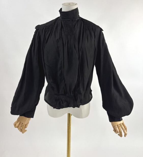 Antique 1900s Black Silk Ruched Bell Sleeve Blouse: Antique 1900s Arts & Crafts Era Black Silk Ruched Bell Sleeve Blouse Top Shirt. With ruching throughout and snaps and hooks up front. Light wear as shown consistent with age. Measures 40 inch bust, 34