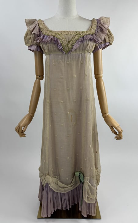 Vintage 1930s does Regency Empire Waist Gown: Vintage 1930s does Regency Empire Waist Gown Dress. With pleated and ruffled bust and short puffed sleeves. Pleated hem with silk ribbon details. Snaps up center back to close. Measures 32 inch bust, 