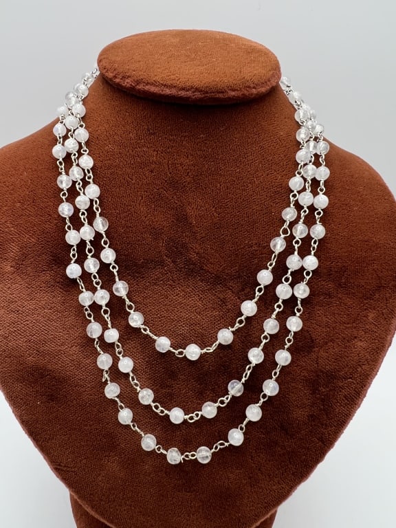 Handmade Moonstone Bead on Sterling Wire Necklace: Handmade Moonstone Bead on Sterling Wire Necklace. Necklace strand handmade with sterling silver wire and moonstone beads. Measures 36 inches in length.