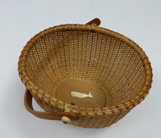 Vintage Handmade Nantucket Basket w Carved Bone: Vintage Handmade Nantucket Basket w Carved Bone Whale. Measures 5.5 x 8.25 x 8 inches.