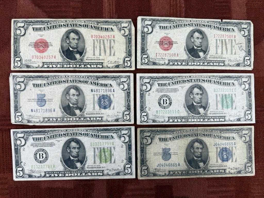 Collection Antique 1928 & 1934 $5 Dollar Bills: Collection Antique 1928 & 1934 $5 Dollar Bills. Includes 2 series of 1928 $5 bills, one marked 1928 F & 4 series of 1934 $5 bills one of which is marked 1934 A & two of which are marked 1934 C.