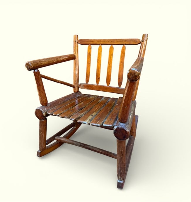 Habitant Adirondack Log Cabin Style Rocking Chair: Habitant Adirondack Log Cabin Style Rocking Chair. Made by Habitant Furniture from Michigan. Measures approximately 37 inches in height, 28.5 inches in width, 31.5 inches in depth. From a Lake