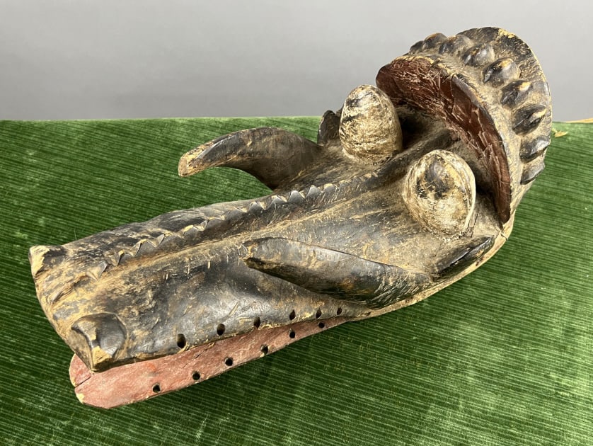 Antique Hand Carved & Painted African Wooden Mask: Antique Hand Carved & Painted African Wooden Mask. Measures approximately 17 x 8 x 7 inches.