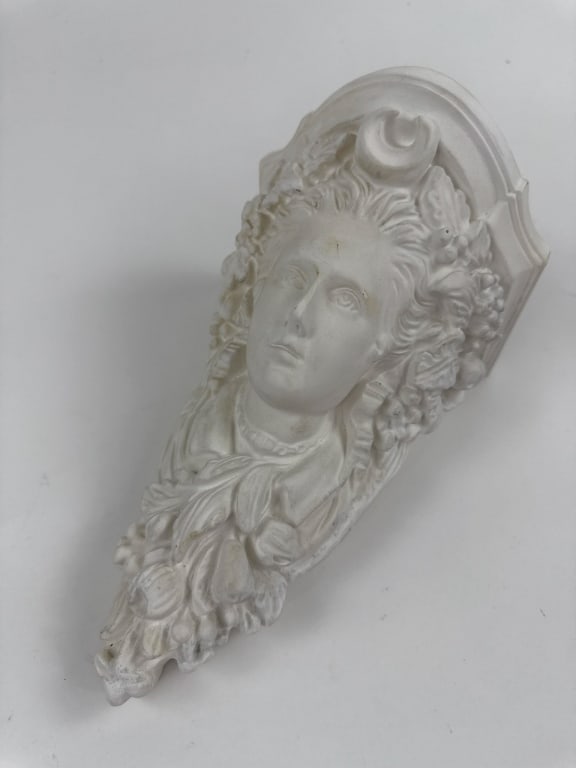Vintage Plaster Composition Corinthian Bracket: Vintage Plaster Composition Corinthian Wall Bracket. Measures approximately 10 x 6.5 x 6.5 inches in size. Has recessed space with hook on back for mounting to wall.