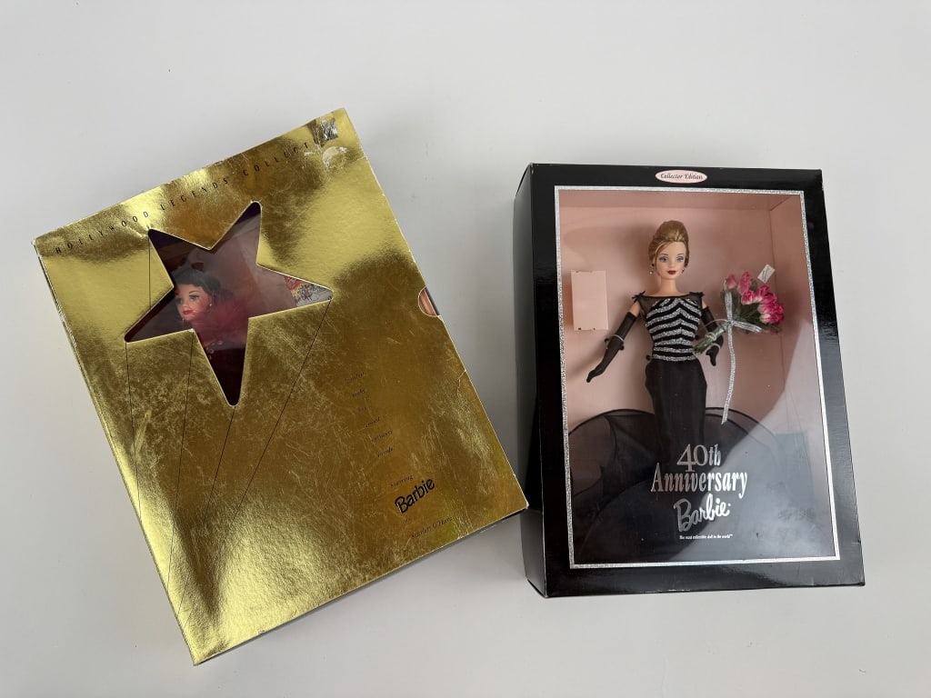 40th Anniversary & Hollywood Legends Barbie in Box: 40th Anniversary & Hollywood Legends Barbie in Boxes. 40th Anniversary Barbie in original box together with a Hollywood's Legend Barbie of Scarlet O'hara Gone with the Wind in its original box. Larger