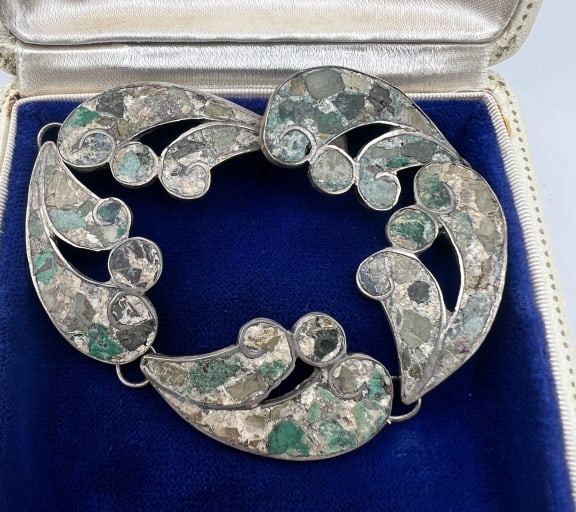 Vintage Modernist Sterling & Turquoise Bracelet: Vintage Modernist Sterling & Turquoise Bracelet. Vintage Mexico sterling silver and turquoise mosaic articulated panel bracelet with hallmark 925 and JH. Measures just under 8 inches in length.