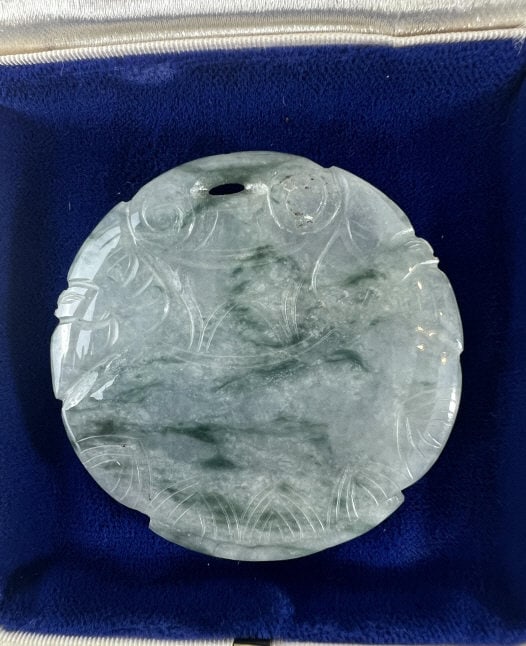 Estate Chinese Carved Jade Necklace Pendant: Estate Chinese Carved Jade Necklace Pendant. Carved spinach jade. Carved on both sides. Measures 2.25 inches in diameter. This lot is apart of a lifetime collection of Chinese export silver, jade,