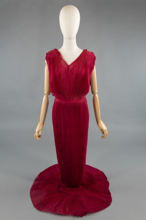 Vintage 1960s Balenciaga Accordion Pleat Gown: Vintage 1960s Balenciaga Couture Accordion Pleated Column Gown Dress. V-neckline with accordian pleats throughout. Zips at side to close. In fair vintage condition with spots, holes, and wear as shown