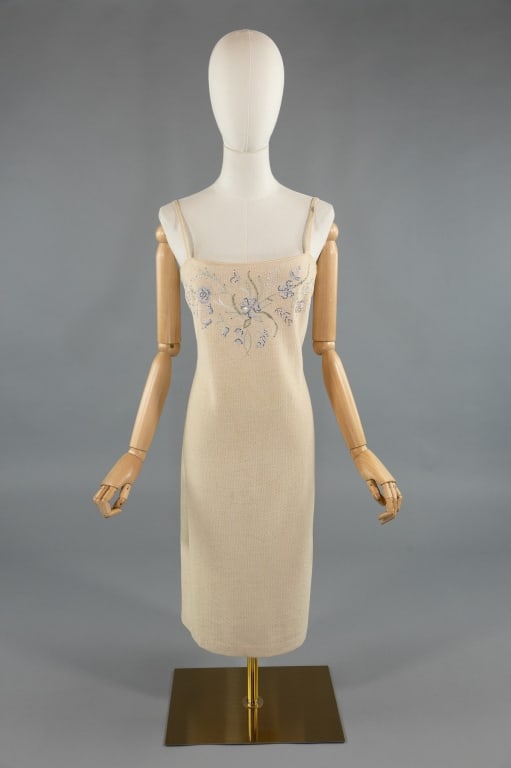 Vintage 1990s St. John Rhinestone Knit Dress: Vintage 1990s St. John Rhinestone Embroidered Knit Dress. Chest embroidered and embellished with rhinestones. Zips down center back to close. Marked size 8. With stretch throughout. Measures 34 - 36