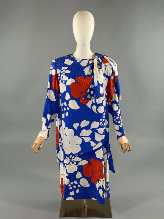 Vintage 1980s Guy Laroche Silk Floral Shift Dress: Vintage 1980s Guy Laroche Silk Floral Shift Dress. Buttons at neck to close with draped tie at neck. Loose, oversize fit. Fully lined. Marked size 44. Measures 42 inch bust, 43 inches long, 22 inch sl