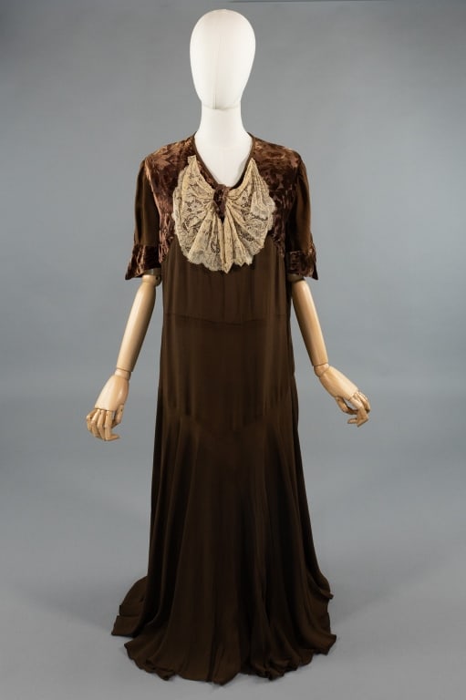 Antique 1920s Brown Crepe & Devore Velvet Gown: Antique 1920s Brown Crepe & Devore Velvet Gown Dress. Short sleeves with devore burnout velvet at shoulders. Lace detail at neck. No closures, slides over head. Light wear throughout consistent with a