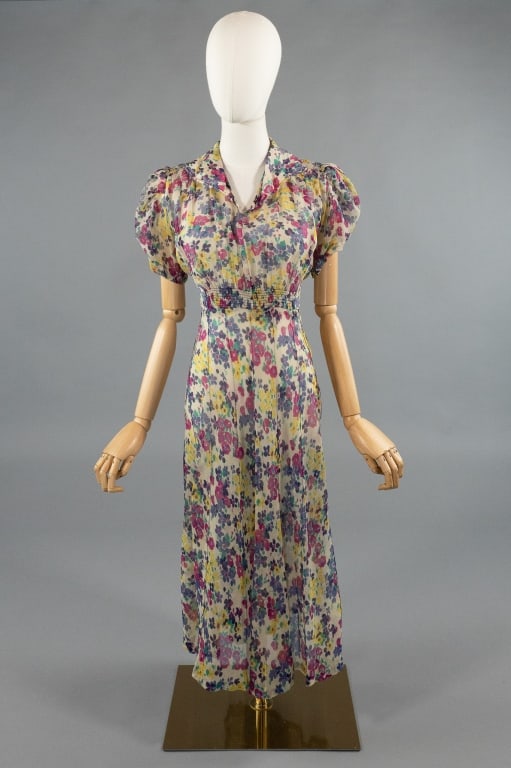 Vintage 1930s Floral Silk Chiffon Day Dress: Vintage 1930s Floral Silk Chiffon Day Dress. Smocked at waist with tulip sleeves and seaming through skirt. Measures 34 - 36 inch bust, 28 - 32 inch waist, 44 inches long, 7 inch sleeve length.