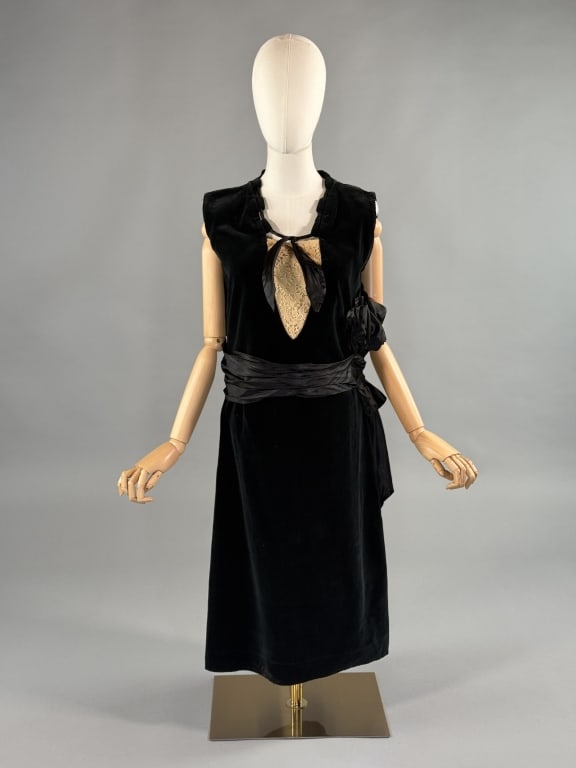 Antique 1920s Black Velvet Lace Belted Shift Dress: Antique 1920s Black Velvet Lace Belted Shift Dress. Sleeveless dress with lace detail at chest. Silk ribbon details at neckline and waist. Snaps at side to close. Measures 36 inch bust, 32 inch