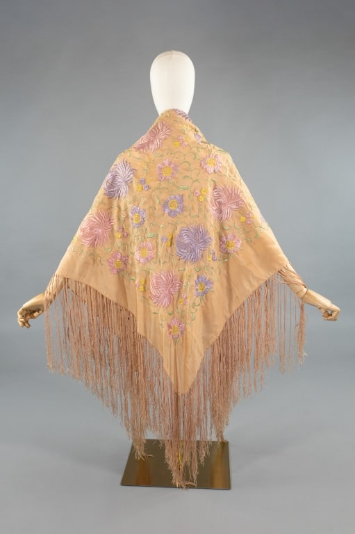 Antique 1920s Pastel Silk Embroidered Piano Shawl: Antique 1920s Pastel Silk Floral Embroidered Piano Shawl. Peach ground with pink and purple flowers throughout with green and yellow details. Light spots and wear throughout as shown. Measures approxi