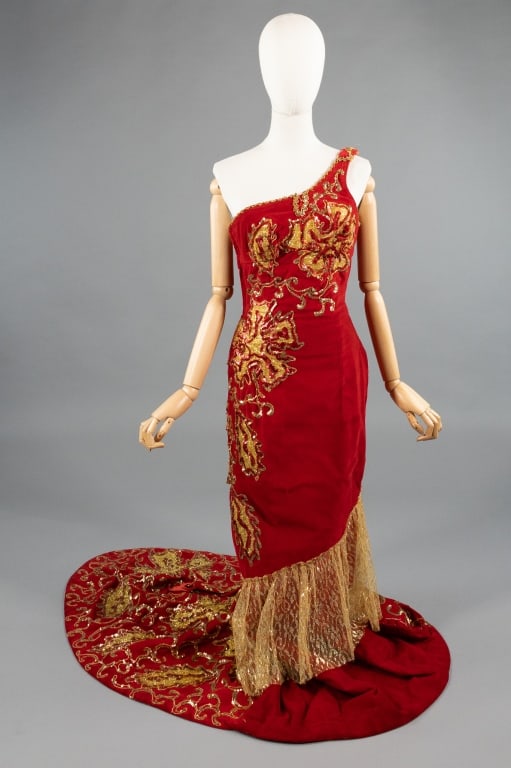 Vintage 1950s Red Velvet Burlesque Sequin Gown: Vintage 1950s Red Velvet Burlesque Stage Costume Sequin Applique Gown Dress. One shoulder dress with side zip closure and sequin/lame appliques throughout. Dramatic train at back. Fully lined. Labeled