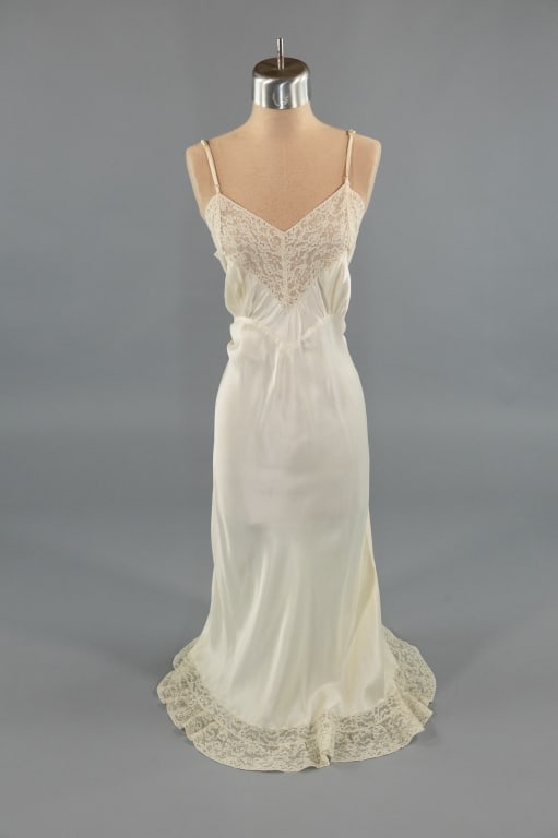 Vintage 1940s White Satin Slip Dress Night Gown: Vintage 1940s White Satin Slip Dress Lace Lingerie Night Gown. Lace detail at bust and hem. Adjustable shoulder straps. Labeled Colony Club. Bias cut with stretch throughout. Wear throughout as shown.