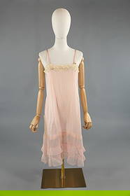 Antique 1920s Pink Silk & Lace Ruffle Slip Dress: Antique 1920s Pink Silk & Lace Ruffle Slip Dress Night Gown. With lace and floral ribbon details at bust. Silk ribbon straps with adjustable silk ribbon at bust. Tiered ruffled hem. Lace trimmed slits