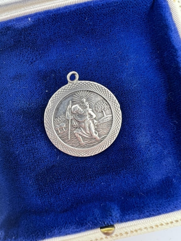 Vintage Silver St Christopher Religious Medal: Vintage Silver St Christopher Religious Medal Necklace Pendant or Charm. Marked SILVER on the back. Measures 1.25 inches in length with the bail.