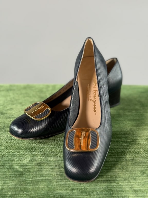 Vintage Salvatore Ferragamo Leather Loafers Shoes: Vintage Salvatore Ferragamo Leather Loafers Shoes having textured pattern throughout and gold tone metal accent at toe with logo. Marked size 6.5 - measuring 9.5 inches heel to toe. Light wear to sole