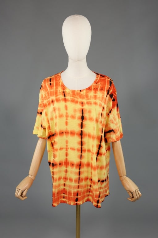 Proenza Schouler Orange Cotton Tie Dye T-Shirt Top: Proenza Schouler Orange Cotton Tie Dye T-Shirt Top having tie dye pattern throughout. Marked size XL - 23 inches flat across chest, 27 inches long, 9 inch sleeve length with stretch throughout.