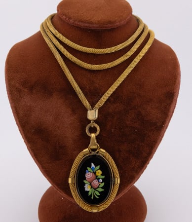 Antique 19th C Victorian Reverse Painted Necklace: Antique 19th C Victorian Reverse Painted Necklace. Antique yellow gold filled or gilt metal articulated woven necklace chain with a floral motif reverse painted on glass necklace pendant that resemble