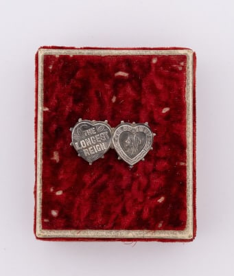 Antique 19th C Queen Victoria Sterling Mourning: Antique 19th C Queen Victoria Sterling Mourning Double Heart Brooch. The pin back is broken off. Sterling silver, English hallmarks on back. Measures just over 1.25 inches in width.