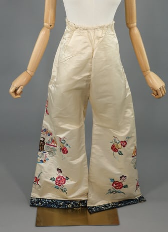Vintage 1930s Ivory Silk Embroidered Pajama Pants: Vintage 1930s Ivory Silk Embroidered Pajama Pants having embroidery at bottom hems of pant legs. Elastic waist is stretched out. Measuring 40 inch waist, 18 inch rise, 25 inch inseam.