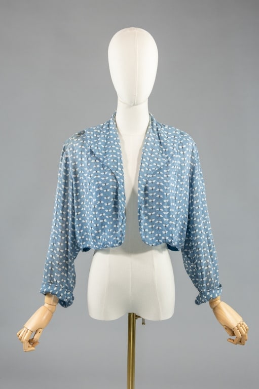 Vintage 1930s Butterfly Print Bolero Crop Jacket: Vintage 1930s Butterfly Print Bolero Crop Jacket Top having open front with small collar and long sleeves. Light wear throughout as shown. Measuring 40 inch bust, 15.5 inches long, 18 inch sleeve leng