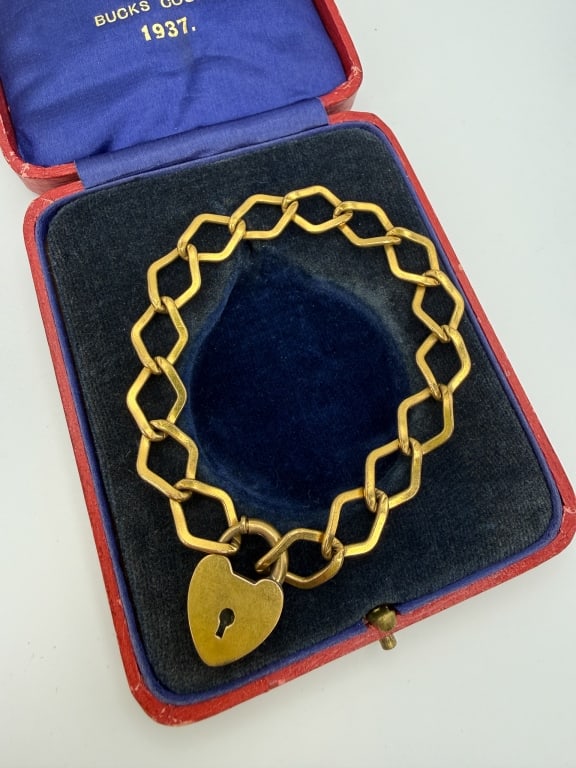 Vintage 1930s Gold Fill Heart Padlock Bracelet: Vintage 1930s Gold Fill Art Deco Monogram Heart Padlock Charm Bracelet with hear padlock charm as spring ring closure. Light wear as shown. Measuring approximately 7 inches long.