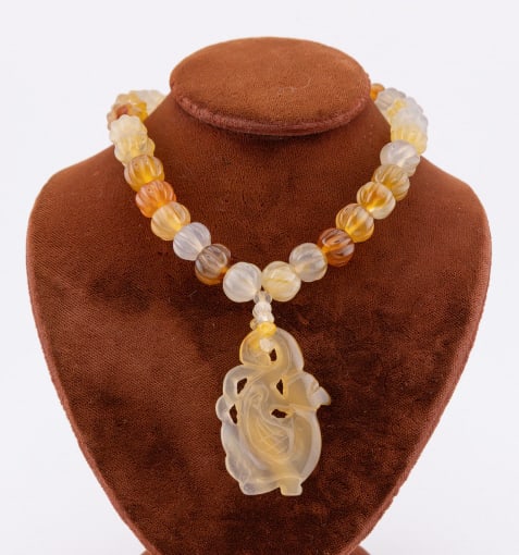Sterling Silver Carnelian & Jade Chinese Necklace: Sterling Silver Carnelian & Jade Chinese Necklace. Hand carved beads / pendant in carnelian and jade with a hallmarked sterling silver clasp. Beaded necklace measures just over 16 inches in length, pe