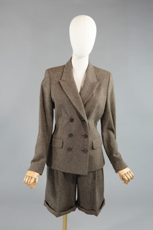 Vintage 1990s Laura Ashley Wool 2 Pc Shorts Suit: Vintage 1990s Laura Ashley Wool 2 Pc Shorts Suit having double breasted blazer jacket and wide-leg pleated shorts. Both fully lined. Marked US 8. Jacket measuring 38 inch bust, 34 inch waist, 35 inche